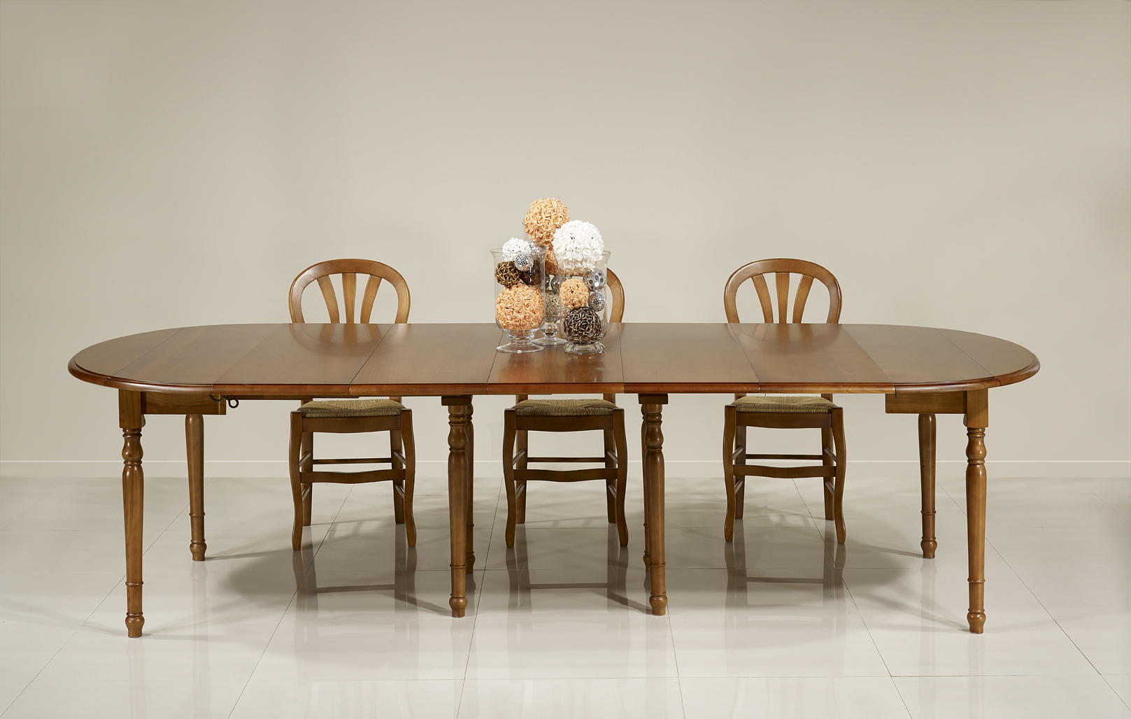 Table ronde à volets DIAMETRE 120  en merisier massif de style Louis Philippe 5 allonges de 40 cm